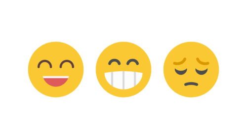 Three yellow emojis in a row, a happy face, a smiley face and a sad face.