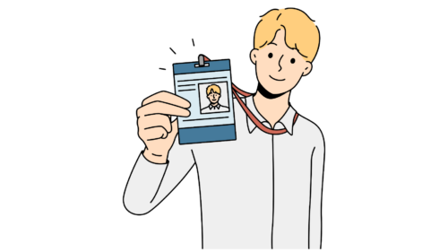 An employee showing his ID badge.